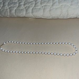 White and gold necklace